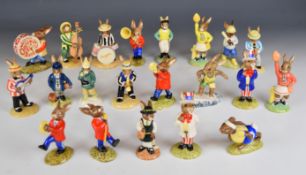 Twenty one Royal Doulton Bunnykins including six Oompah Band members, five Jazz Band figures and