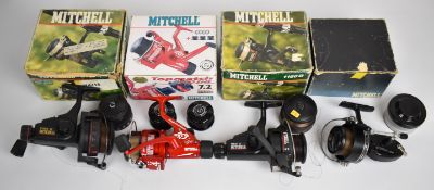 Four boxed Mitchell fixed spool fishing reels comprising Mitchell 300A, Topmatch 400 SHS, 12165G
