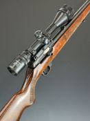 CZ .22 bolt-action rifle with chequered semi-pistol grip and forend, sling mounts, adjustable sight,