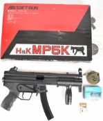 Heckler & Koch MP5K 7mm assault style airsoft rifle with folding tactical stock, adjustable