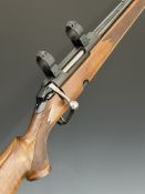 Tikka M590 RH .243 bolt-action rifle with chequered semi-pistol grip and forend, raised cheek piece,
