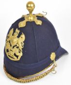 British Royal Artillery blue cloth helmet, the skull probably original but with later / copy