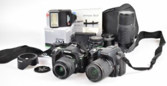 Two digital SLR cameras comprising Konica Minolta Dynax 5D with AF DT zoom 18-70mm 1:3.5-5.6D lens