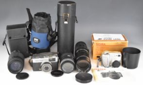 SLR camera lenses comprising Sigma 55-200mm 1:4-5.6 DC to suit Canon, Sigma DL zoom 75-300mm 1:4-5.6