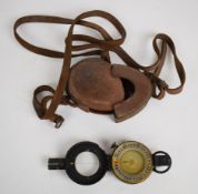 British WW2 prismatic compass by T.G Co Ltd London No. 8171422 MkII, dated 1942 with broad arrow