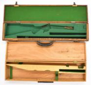 Two shotgun or rifle carry cases including one oak example with fitted interior, largest 80.5cm