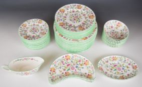 Minton twelve place dinner service with extras decorated in the Haddon Hall pattern, comprising