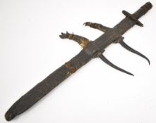 African tribal short sword with skin covered grip and crosspiece, Thuluth script decorated 55cm