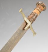 Sudan Kaskara sword with wooden grip and Thuluth script decorated double edged 55cm blade. PLEASE
