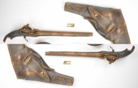 A collection of gun and shooting related items comprising an Miquelet flintlock pistol with ornate