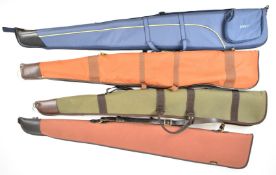 Four shotgun or rifle slips including GMK and Napier, largest 140cm long.