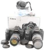 Two Canon EOS 5D digital SLR cameras, one being a Mk II model, in original box, with Canon 55-