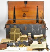 Collection of militaria including RAF buttons, badges, spent .303 cartridges, clips, gaiters,