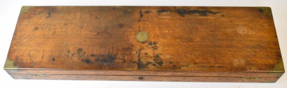 William Moore of London brass bound oak gun case with fitted interior and label to lid, 87x25.5x8cm.