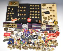 Collection of military metal and cloth badges including proficiency, qualification, The King's