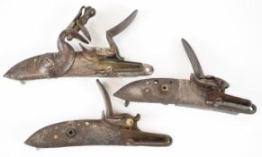 Three flintlock rifle, Brown Bess or sporting gun locks, two stamped 'Tower' and with crown over '