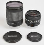 Two Nikon SLR camera lenses comprising AF Nikkor 35mm 1:2 D and AF Nikkor 28-100mm 1:3.5-5.6 G, both