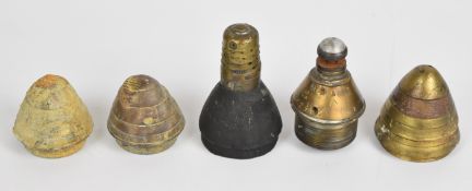 Five WW1 artillery fuse cones including a British number 106 and a French example marked 31 MLE97