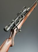 Walther .22 bolt-action rifle with chequered semi-pistol grip and forend, raised cheek piece,