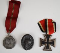 German WW2 Nazi Third Reich Iron Cross together with a Wound Badge and Russian Eastern Front Medal