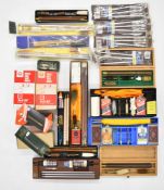 A collection of shotgun and rifle gun cleaning kits and accessories including Beretta, Parker-