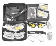Two pairs of Daisy shooting glasses with interchangeable lenses, in fitted cases, unused.