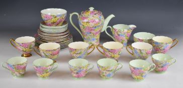 Vintage Shelley tea set decorated in the Rock Garden pattern, no 13454 to base, approximately thirty