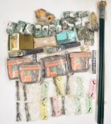 A collection of shooting and hunting related items, Caldwell shooting sticks, woodland camo, hide