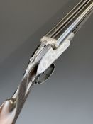 James Purdey & Sons 12 bore assisted-opening side by side sidelock shotgun with fine rose and scroll