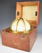 Husun star globe by H Hughes & Son Ltd and dated 1920, with brass framework, in original fitted