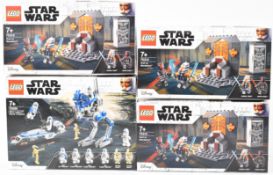Four Lego Star Wars sets comprising three Duel on Mandalore 75310 and 501st Legion Clone Troopers