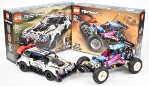 Two Lego Technic App controlled cars comprising Off-Road Buggy 42124 and Top Gear Rally Car 42109,