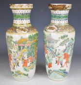 Pair of 19thC Chinese famille verte vases with figural decoration, 24.5cm tall.