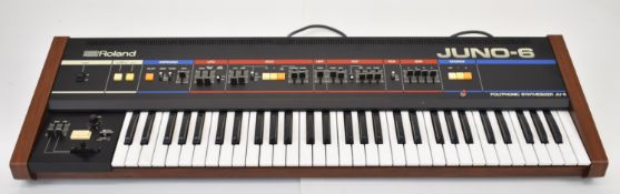 Roland Juno-6 Polyphonic Synthesizer with 61 keys, JU-6, in original box.