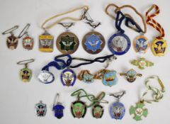 Twenty one Phoenix Park Racecourse Club metal and enamel horse racing badges including 1920-1921