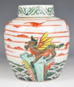 19thC Chinese famille verte ginger jar and cover decorated with bats and foo lions, with six