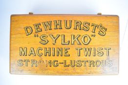 Haberdashery counter top shop display advertising chest of two straight drawers for 'Dewhurst's '