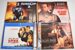 Twenty mostly 1990s British quad film posters to include Striking Distance, Robocop 3, The Pelican