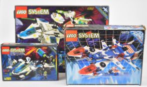 Three 1990s Lego System sets comprising Explorien Starship 6982, Deep Freeze Defender 6973 and