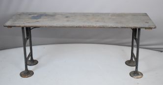 19th / 20thC elm and cast iron shopfitting / industrial elm single plank bench / trestle or low