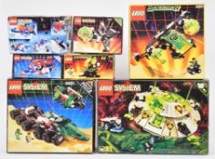 Seven 1990s Lego System sets comprising Alien Avenger 6975, Aerial Intruder 6981, Solar Snooper