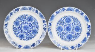 Pair of Chinese shallow blue and white dishes with chrysanthemum decoration and six character Kangxi