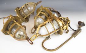 Set of four brass ship's / nautical caged hanging electric lights, two with brackets, H37cm