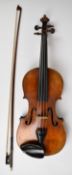Violin with two piece back 36cm in length excluding button, with rosewood tuning pegs and label to