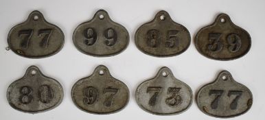 Eight cast metal wine bin labels / tickets, most with L. Lumley & Co, America Square, London