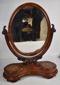 19thC mahogany serpentine fronted dressing table mirror with oval tilting mirror and two circular
