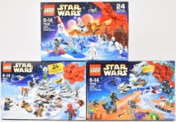Three Lego Star Wars Christmas Advent Calendars comprising set numbers 75213, 75146 and 75184, in