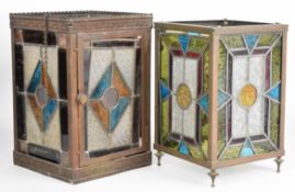 Two bronze / copper Arts and Crafts stained glass hanging light fittings, one with hinged door,