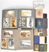 Two albums of 20thC postcards, mostly topographical to include Weymouth, Eastbourne, Weston,