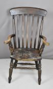 19thC elm seated Windsor armchair with scrolling armrests, H116cm